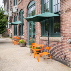 exterior entrance to coworking space with outdoor seating